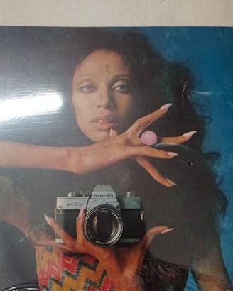 Libro Minolta SRT-101 tecnica Reflex