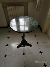 Tavolo tondo in marmo con piede in ferro battuto