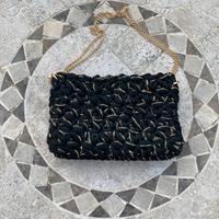 Pochette nera e oro fatta a mano in lycra in italy