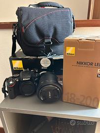Nikon D5100 + Nikkor 18-200 VR II