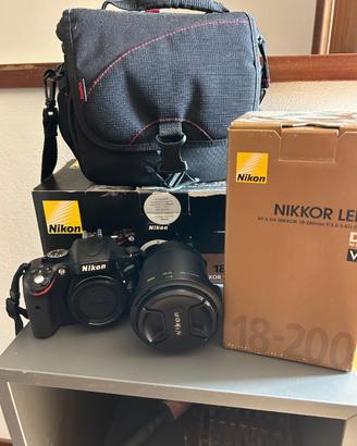 Nikon D5100 + Nikkor 18-200 VR II