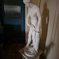 statua 