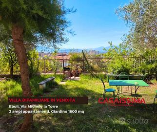 Villa bifamiliare con giardino
