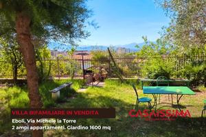 Villa bifamiliare con giardino