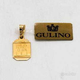 Ciondolo in oro giallo 18 kt "RH"  E.380
