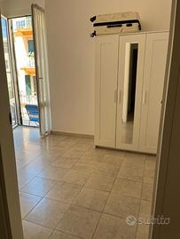 Camera singola con balcone in centro