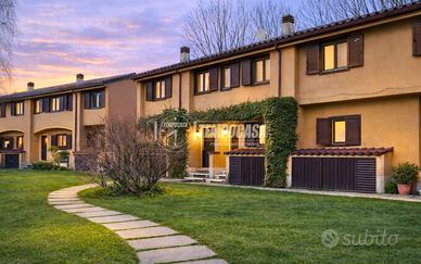 VILLETTA ARREDATA CON GIARDINO, BOX E POSTO AUTO