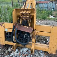 Retro scavatore per motopala