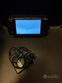 Psp 3004 con caricatore e batteria nuova