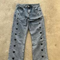 Pantalone jeans con divoletti