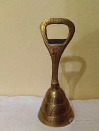 Apribottiglie d'ottone vintage con campanella