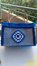 Borsa fatta in cordino e jeans all'uncinetto 