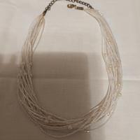 Collana bianca a  più fili 