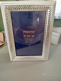 Album foto con cornice argentata