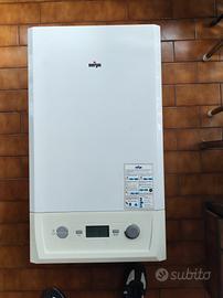 Caldaia da riparare e tubo scarico fumi 