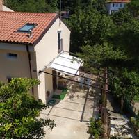 Casa con giardino