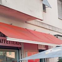 tendone a bracci arancio prezzo un po' trattabile