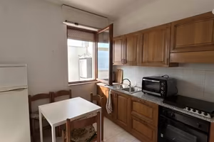 Ampio appartamento con veranda e cortile