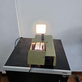 Schermo Bell e Howell e Proiettore diapositive Fer