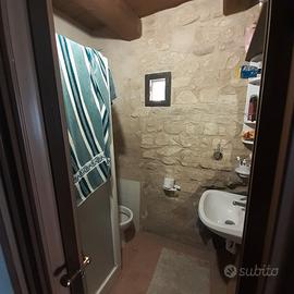 Fano, bilocale con giardino