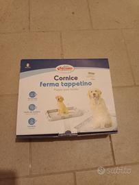 cornice per tappetino 