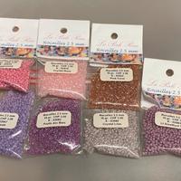 N. 7 bustine roccailles da mm2,5