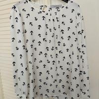 camicetta bianca con disegni neri. Tg 44