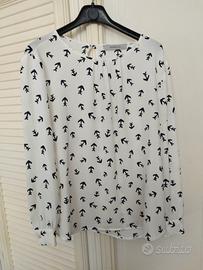 camicetta bianca con disegni neri. Tg 44