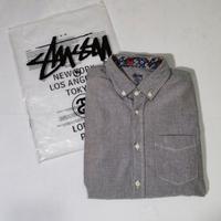 Camicia Stussy grigia con taschino e logo S uomo