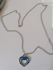 Collana lunga acciaio Kris cuore, nuova