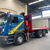 MAN 19.414 con gru FASSI 230