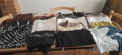 Maglie felpe pantaloni e scarpe in blocco