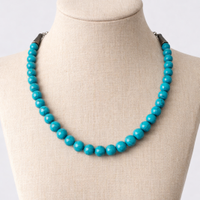 Collana perline effetto turchese moschettone