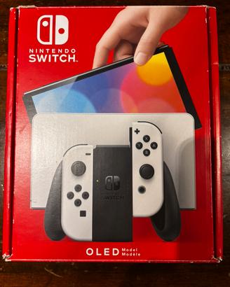Nintendo oled +fc24,minecraft ( trattabile )