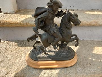 statua