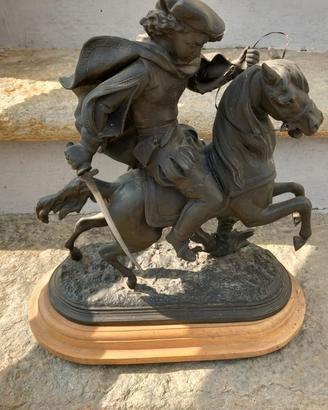 statua