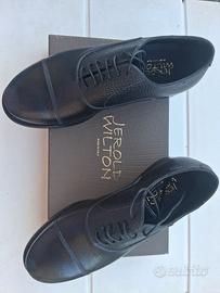 calzature uomo di pella nera nr 40