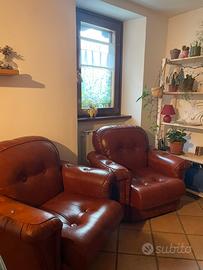 Coppia di poltrone in pelle