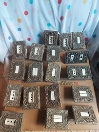 Placche e interruttori vintage in ottone e ceramic