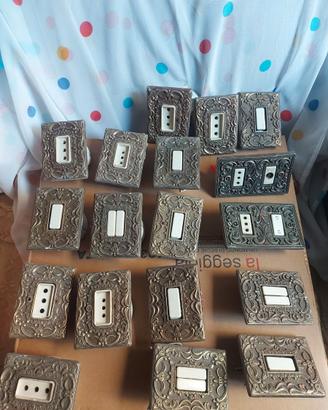 Placche e interruttori vintage in ottone e ceramic
