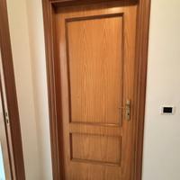 Porte interne artigianali in legno di noce