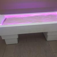 Lettino da massaggio con sale caldo