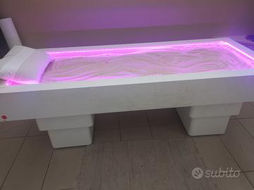 Lettino da massaggio con sale caldo