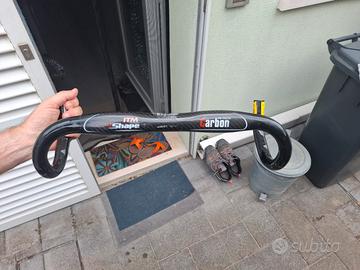 Piega manubrio in carbonio