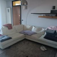 Divano Natuzzi in pelle bianca pienofiore