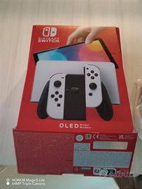 Nintendo switch oled bianca con 6 giochi perfetta