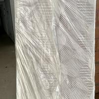 Materasso + rete con doghe nuovi