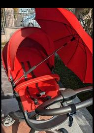 passeggino stokke rosso 