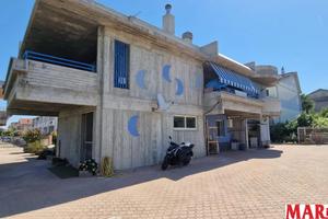 vendita appartamento con corte esterna e ingresso