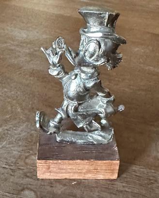 Piccola statuina di Zio Paperone in peltro